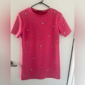 Pink, faux suede, dress with jewels.